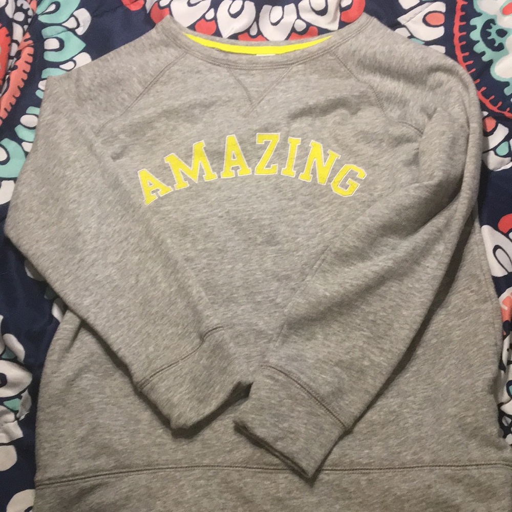 A grey unworn sweatshirt